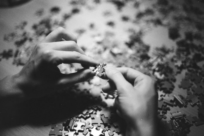 Photo by Benjamin Zanatta grayscale photo of person holding flower